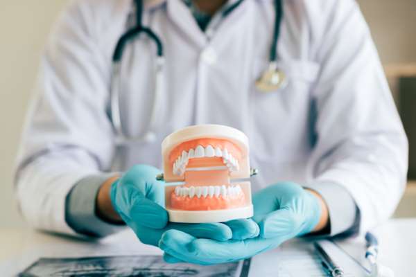 Dental Implants vs. Dentures